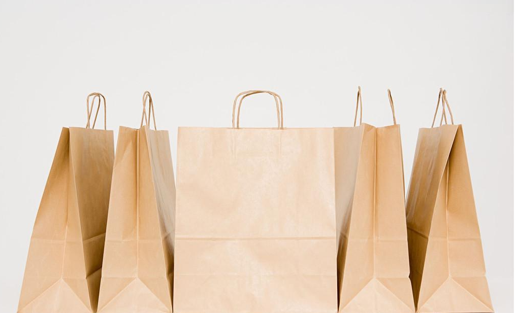 挖口紙袋為什么遠不如提繩手拎紙袋受歡迎？